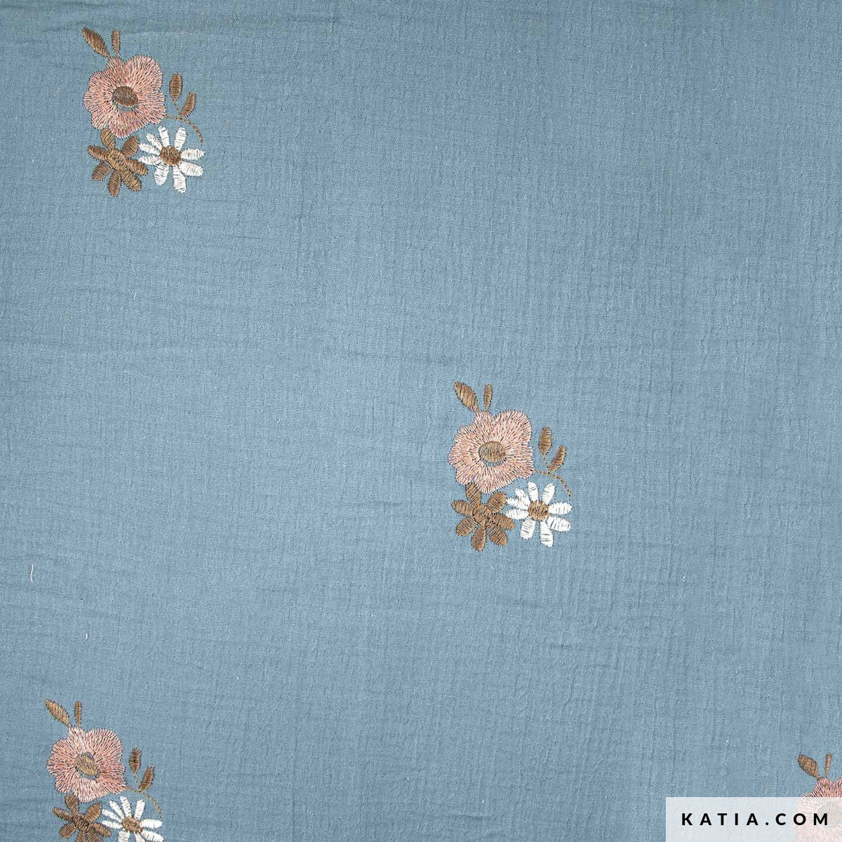 Muselina azul bordada con motivos florales(€/10 cm)