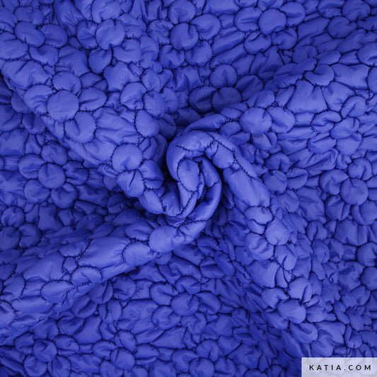 Tela embuatada en forma de flor color blau (€/10cm)