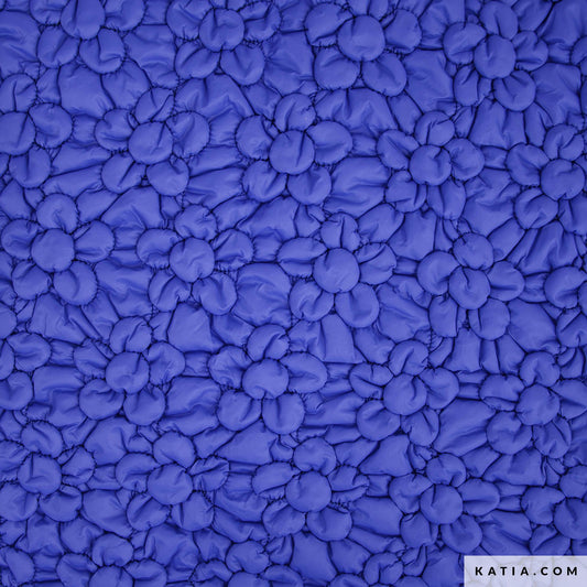 Tela acolchada en forma de flor color azul (€/10cm)