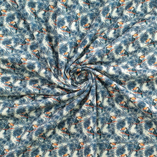 Trozo de tela de algodón con estampado de hojas tropicales y tucanes